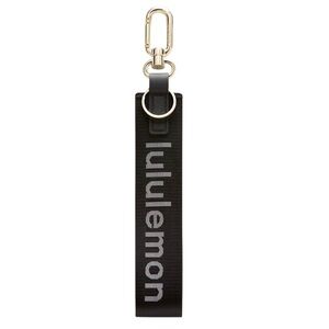 Lululemon Never Lost Keychain  Black/White/Gold